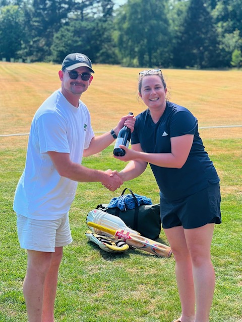 Brad Abraham with his player of the match wine