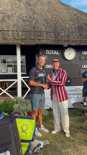Dave Coutts getting his 25 match pin